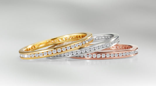 3 Memory Ringe mit umlaufend gefassten Diamanten ausWeissgold, Roségold und Gelbgold